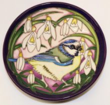 Moorcroft Pottery: 'Blue Tit's Bounty' design pin dish, bird with snowdrops on purple ground,