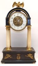 C19th French ebonised and alabaster portico clock, gilt eagle pediment over drum head supported by