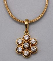 yellow metal floral diamond cluster pendant set with seven brilliant cut diamonds in claw