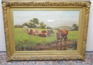 Joseph Dixon Clark (British 1849-1944): Cattle in a riverside meadow, oil on canvas signed 60cm x