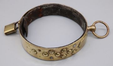 C19th leather lined brass adjustable dog collar, with studded decoration, vacant cartouche, ring and