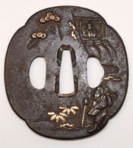 Japanese Nara iron Mumei tsuba to fit wakizashi, 18th century Edo period, with gilt and white