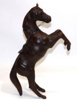 Brown leather covered model of a rearing horse, H45cm