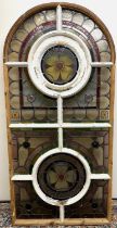 Victorian arched stained glass window, with two rose panels enclosed by geometric surround, H160cm