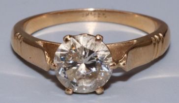 18ct yellow gold diamond solitaire ring, the single brilliant cut diamond in claw setting on tapered