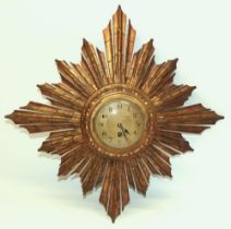 Japy Freres & Co. - C20th gilt wood and gesso sunburst wall timepiece, gold tone engine turned