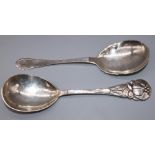 C20th Danish Silver serving spoon, with stylized fruit and planished handle and bowl, stamped