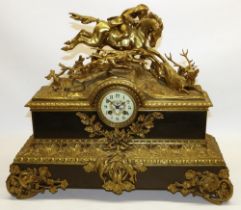 Vincenti et Cie - C19th French slate and brass mantle clock, the case surmounted with an C18th