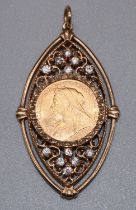 Victorian 1897 sovereign in yellow metal pierced lozenge pendant mount set with clear stones,