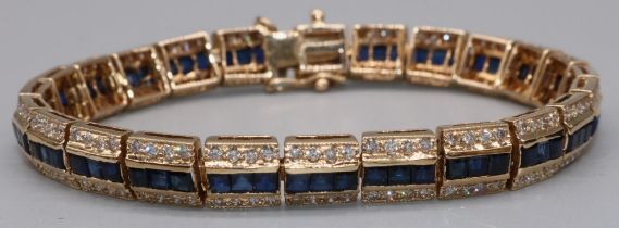 18ct yellow gold articulated bracelet made up of twenty four panels, each set with three square