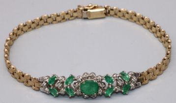 9ct yellow and white gold bracelet, the white gold panel set with emeralds and diamonds on