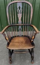 C19th ash and elm high back Windsor chair with pierced splat and shaped seat on turned supports with