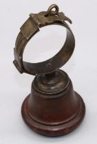 Small C19th hinged brass pet collar with rope-twist detail and lock clasp, later mounted on turned