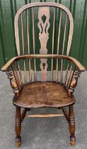 C19th ash and elm high back Windsor chair with pierced splat and shaped seat on turned supports with