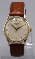 1950's presentation Longines gold wristwatch, signed silvered dial with applied Arabic and baton