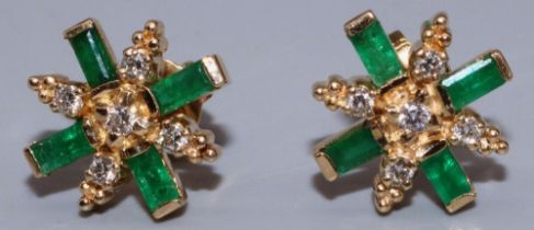 Pair of yellow metal emerald and diamond cluster stud earrings, each set with five brilliant cut