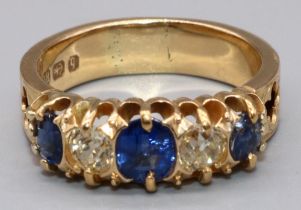 18ct yellow gold five stone sapphire and diamond ring, the three oval cut sapphires separated by two