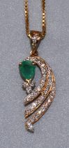 18ct yellow gold abstract emerald and diamond pendant, with pear cut emerald beside three rows of