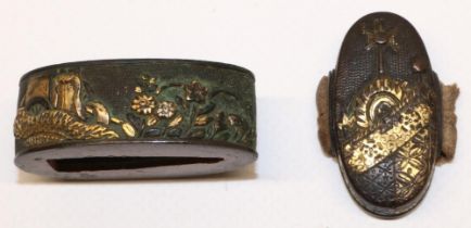 Japanese 17th century Edo era Fuchi Kashir, Mumia to fit wakizashi, with Takahori Zogan in gold