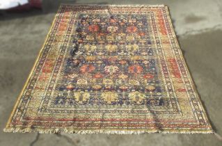 Belgian wool Persian pattern multicoloured carpet, scroll and medallion filled blue ground field