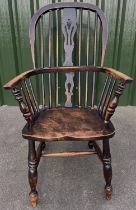 C19th ash and elm high back Windsor chair with pierced splat and shaped seat on turned supports with