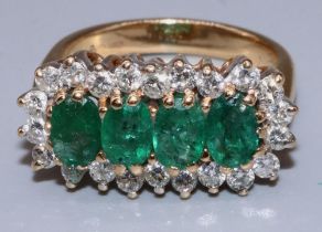 18ct yellow gold diamond and emerald cluster ring, the four oval cut emeralds surrounded by a halo