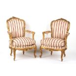 Property of a deceased estate - a pair of early 20th century French Louis XV style carved giltwood