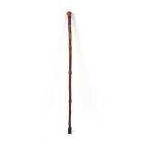 An early / mid 19th century folk art briar walking cane, with pen-work decoration along its entire