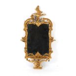 Property of a deceased estate - a George III style gilt painted wall mirror, parts 19th century,