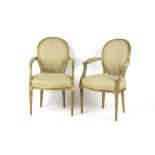 Property of a lady - a pair of early 20th century French Louis XVI style green & gilt framed open