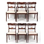A set of six William IV mahogany dining chairs, circa 1835, including one carver, with reeded sabre
