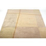 Property of a lady - a modern beige wool rug, 94 by 68ins. (239 by 173cms.).