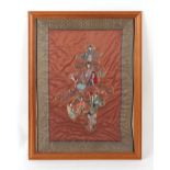A Chinese embroidered silk panel depicting a single calligraphy character filled with figures, 31.