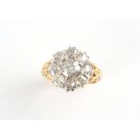 An 18ct yellow gold diamond cluster ring, the estimated total diamond weight 2.26 carats, size O.