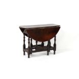 Property of a gentleman - a small William & Mary oak oval topped gate-leg table, circa 1670/80, of