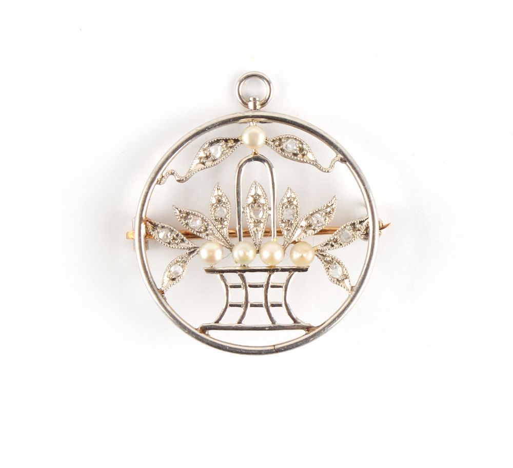 Tiffany & Co. - an early 20th century diamond & pearl brooch modelled as a basket of flowers in a