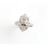 An Art deco style platinum or white gold diamond ring, the centre round brilliant cut diamond in