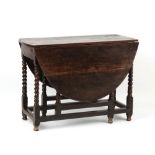 Property of a deceased estate - a late 17th / early 18th century oak oval topped gate-leg table with