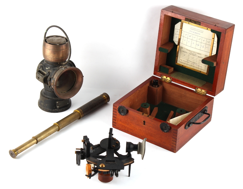 Property of a deceased estate - a cased sextant; together with a telescope; and a carriage lamp (3).