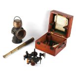 Property of a deceased estate - a cased sextant; together with a telescope; and a carriage lamp (3).