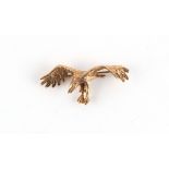 Property of a deceased estate - a 9ct gold brooch modelled as an eagle in flight, 47mm wide,