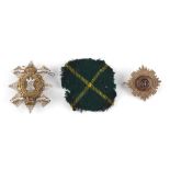 Property of a lady - a Royal Highlanders Black Watch silver cap badge, 72mm long; together with