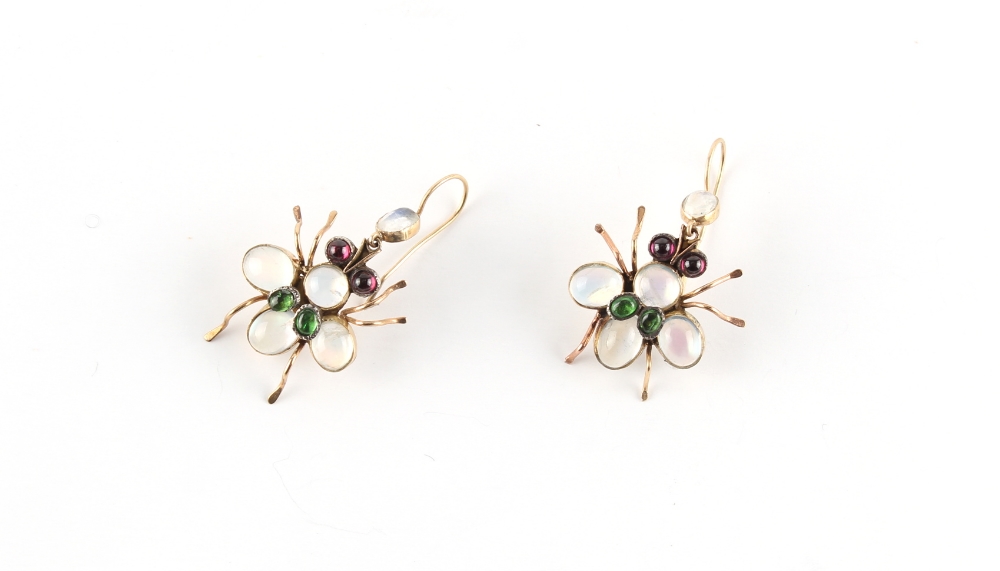 A pair of multi gem set insect earrings, set with cabochon moonstones, garnets & green stones,