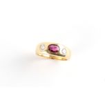 A 14ct yellow gold ruby & diamond gipsy style ring, the oval cut ruby weighing approximately 0.50