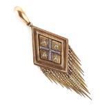 A large Victorian Etruscan Revival unmarked gold (tests 15ct) diamond & blue enamel fringed pendant,