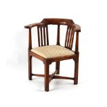 Property of a deceased estate - a George III elm corner chair, third quarter 18th century, with