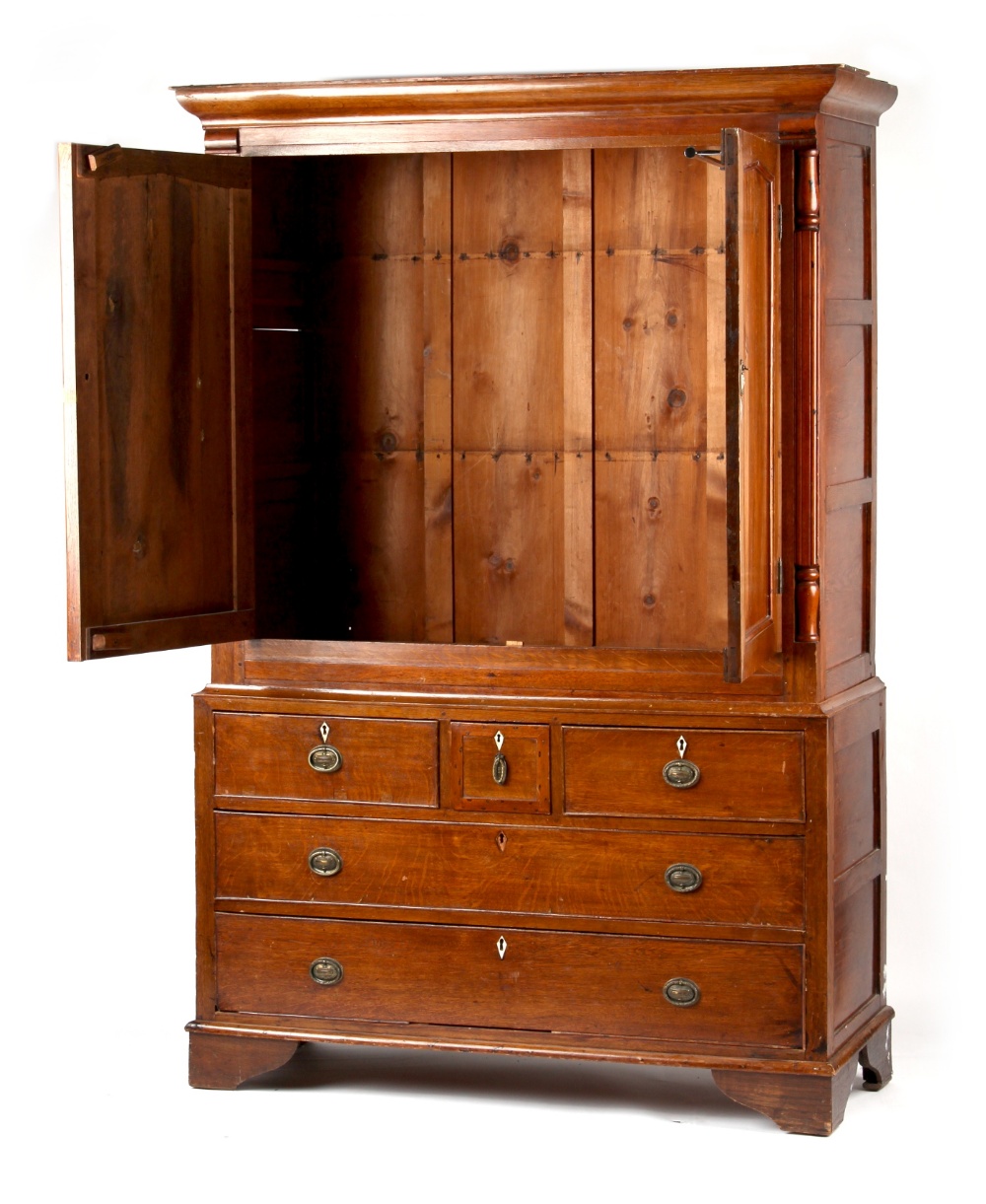 Property of a gentleman - a George III oak housekeeper's cupboard or linen press cupboard, in two - Image 2 of 2