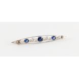 An early 20th century sapphire & diamond marquise shaped brooch, the three sapphires weighing an