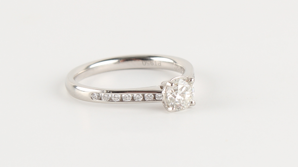 A platinum diamond single stone ring, the W.G.I. certificated round brilliant cut diamond weighing - Image 2 of 2