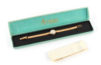 Property of a deceased estate - a lady's Accurist 9ct gold cased wristwatch with 21 jewels, on 9ct